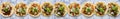 Row of mexican street tacos with carne asada and al pastor in corn tortilla wide banner composition