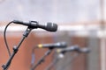 Row of Microphones for Backup Singers Royalty Free Stock Photo