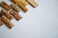 Row of mixed gluten free granola cereal energy bars. With dried fruits and nuts.