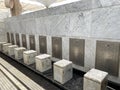 A row of modern ablution (wudu) stations in a mosque. Royalty Free Stock Photo