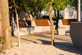 A row of modern concrete benches in the city park at dawn: 27 August 2021 Agidel, Russia Royalty Free Stock Photo