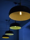 Row of modern round ceiling lights. Royalty Free Stock Photo