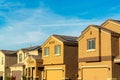 Row of modern suburban houses in downtown middle class american dream neighborhood with gable style roofs