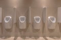 Row of modern Urinals Royalty Free Stock Photo