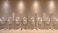 Row of modern Urinals Royalty Free Stock Photo