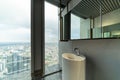 Row of modern white ceramic wash basin in public toilet with cit Royalty Free Stock Photo