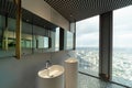 Row of modern white ceramic wash basin in public toilet with cit Royalty Free Stock Photo