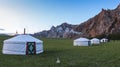 A row of Mongolian gers at a camp at sunset on a summers night Royalty Free Stock Photo
