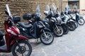 Urban motorcycles aligned on the street Royalty Free Stock Photo