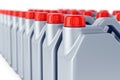 Row of motor oil jerry cans Royalty Free Stock Photo