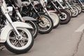 Row of motorcycles parked on a street Royalty Free Stock Photo