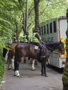 A Row of mounted Police Officers on their Horses waiting to move off on Patrol at Kelvingrove Park in Glasgow.