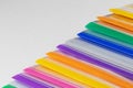 A row of multi-colored plastic folders for paper on a blue background Royalty Free Stock Photo