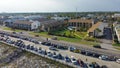 Row of multiple story beach condominium, apartment and vacation rental neighborhood, beach community along 98 Scenic Gulf Drive