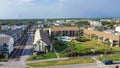 Row of multiple story beach condominium, apartment and vacation rental neighborhood, beach community along 98 Scenic Gulf Drive
