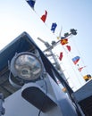 The row of nautical flags and searchlight Royalty Free Stock Photo