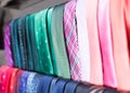 Row of Neckties on hangers in men clothing store Royalty Free Stock Photo
