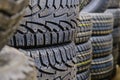 Row of new car tires at tire store. closeup tires in store for sale Royalty Free Stock Photo