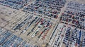 Row of new cars for sale in port at cars export terminal Royalty Free Stock Photo