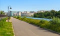 A row of new homes with fenced yards along a sidewalk Royalty Free Stock Photo