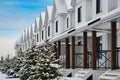 Row of new homes after the snow