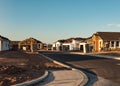 Row of new houses being constructed on a street Royalty Free Stock Photo