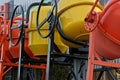 Row of new iron red and yellow concrete mixers Royalty Free Stock Photo