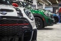 Row of new Mini cooper sports cars displayed at North American International auto show, in Detroit