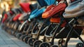 Row of new strollers for sale, brand logos not visible. DOF.