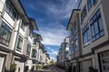 A row of a new townhouses. External facade of a row of colorful modern urban townhouses.brand new houses just after construction o Royalty Free Stock Photo