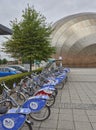 A Row of Next Bikes ready for Hire at the Glasgow Science Centre on Pacific Quay in Glasgow. Royalty Free Stock Photo
