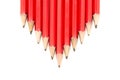 Row of Red Pencils in an Arrow Shape Royalty Free Stock Photo