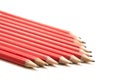 Row of Red Pencils in an Arrow Shape Royalty Free Stock Photo