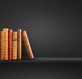 Row of old books on black shelf. Square background Royalty Free Stock Photo