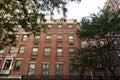 Row of Old Brick Residential Buildings along a Street on the Upper East Side of New York City Royalty Free Stock Photo