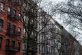 Row of Old Colorful Brick Residential Buildings in Hell`s Kitchen of New York City Royalty Free Stock Photo