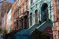 A Row of Old Colorful Brownstone Townhouses with Staircases on the Upper West Side of New York City