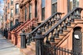 A Row of Old Colorful Brownstone Townhouses with Stairs in Fort Greene Brooklyn New York Royalty Free Stock Photo