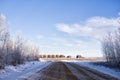 Row old grain bins in winter Royalty Free Stock Photo