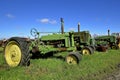 Row of old John Deere tractors Royalty Free Stock Photo