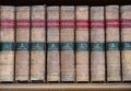 Set of old reference books on a shelf Royalty Free Stock Photo