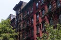 Row of Old and New Residential Buildings with Fire Escapes on the Lower East Side of New York City Royalty Free Stock Photo