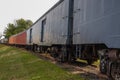 Row of old rusted railroad train cars Royalty Free Stock Photo