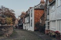 Row of old stone and wooden terraced house on a street in Rye, UK