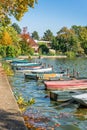 Row of old vintage colorful boats on the lake of Enghien les Bains near Paris France Royalty Free Stock Photo