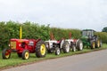 A row of old vintage tractors Royalty Free Stock Photo