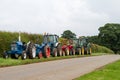 A row of old vintage tractors