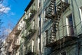 Row of Old Wood Residential Buildings with Fire Escapes in Williamsburg Brooklyn New York