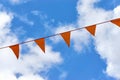 A row of orange triangle banner flags