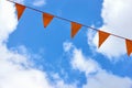 A row of orange triangle banner flags